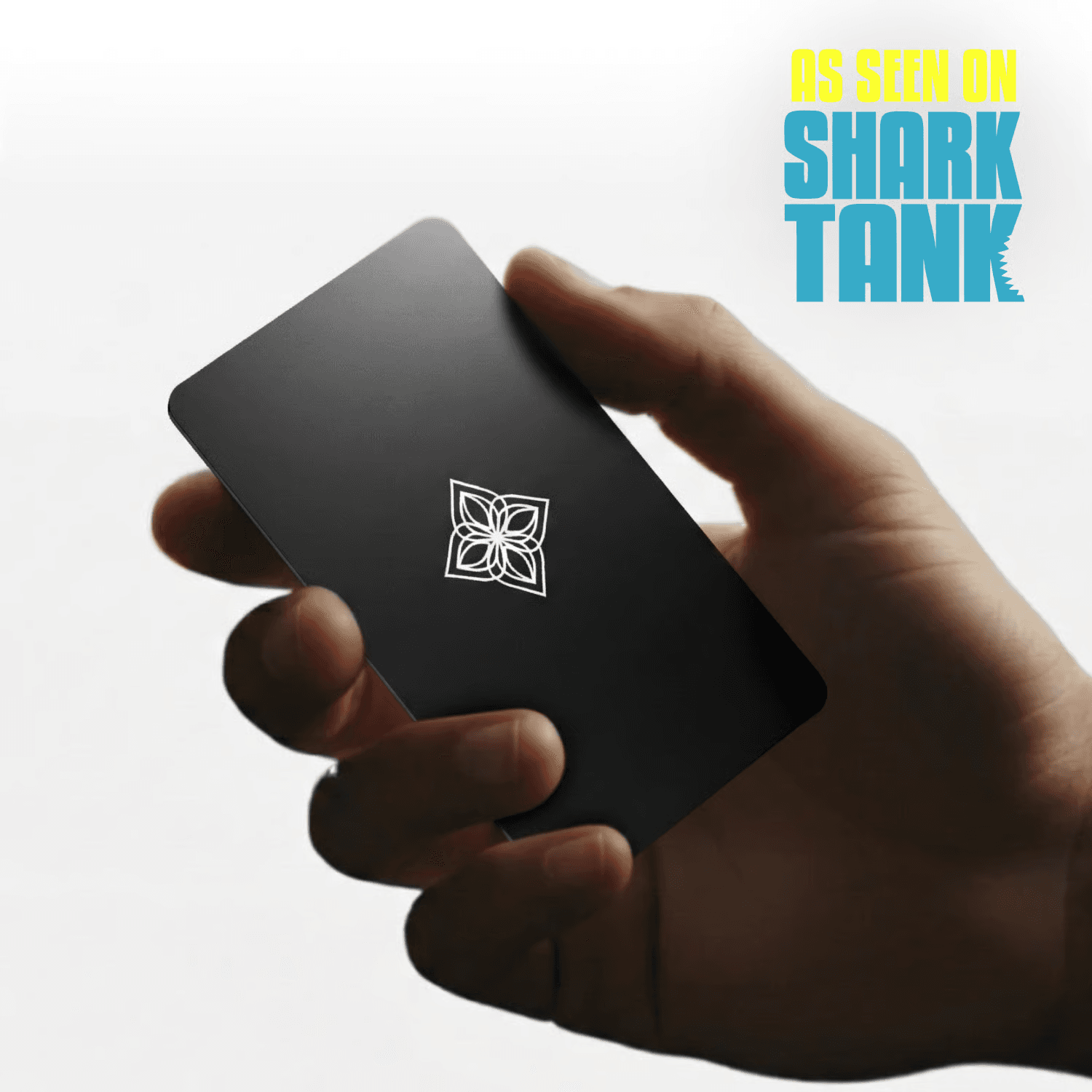 The Bloom Card — a matte-black metal NFC keycard, As Seen On Shark Tank — held in hand